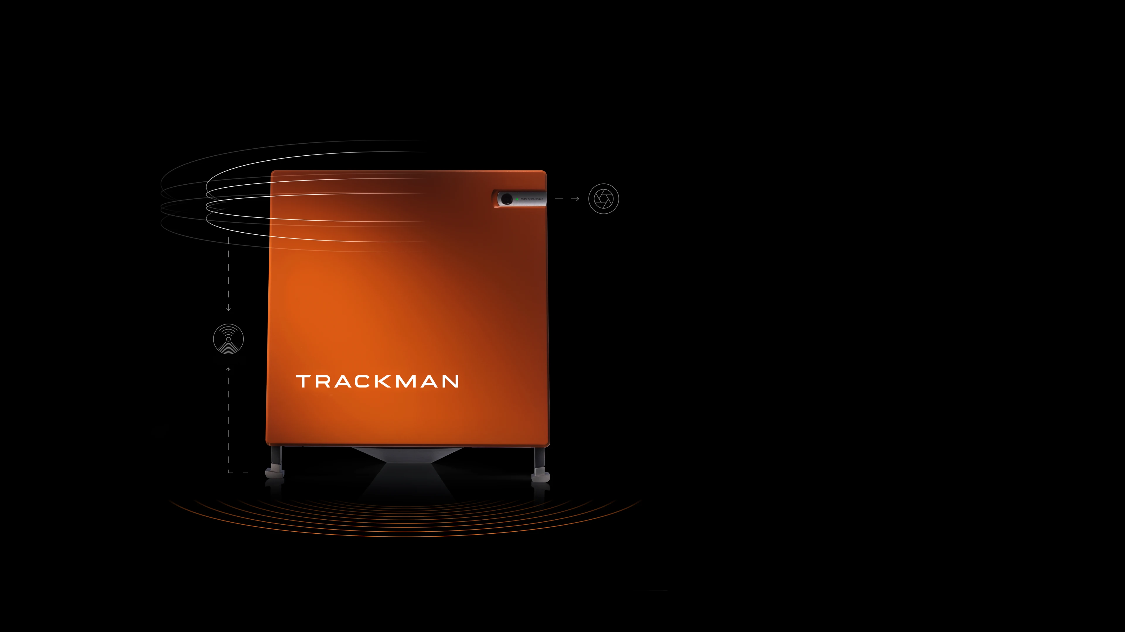 Orange TrackMan device on a black background with circular motion graphics, showcasing its sleek design and advanced technology features.